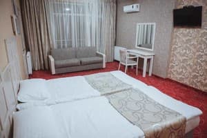 Отель Магнум. Семейный трехместный Люкс 5