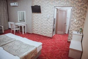 Отель Магнум. Семейный трехместный Люкс 2